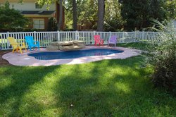 <div class='closebutton' onclick='return hs.close(this)' title='Close'></div><div class='firstH'><img src='images/logo-white-small.png'></div><h1>Free Form Fiberglass Pool</h1><p>Free Form - Aruba Fiberglass Pool #002 by Stoker Pools</p><div class='getSocial'><h1>Share</h1><p class='photoBy'>Photo by Stoker Pools</p><iframe src='http://www.facebook.com/plugins/like.php?href=http%3A%2F%2Fstokerpools.com&send=false&layout=button_count&width=100&show_faces=false&action=like&colorscheme=light&font&height=21' scrolling='no' frameborder='0' style='border:none; overflow:hidden; width:100px; height:21px;' allowTransparency='true'></iframe><br><a href='http://pinterest.com/pin/create/button/?url=http%3A%2F%2Fwww.stokerpools.com&media=http%3A%2F%2Fwww.stokerpools.com%2Fimages%2Fgalleries%2Fconcrete%2Fwm%2Fconcrete-pool-by-stoker-pools-001.jpg&description=Pools' data-pin-do='buttonPin' data-pin-config=\'above\'><img src='http://assets.pinterest.com/images/pidgets/pin_it_button.png' /></a><br></div>