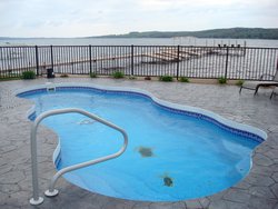 <div class='closebutton' onclick='return hs.close(this)' title='Close'></div><div class='firstH'><img src='images/logo-white-small.png'></div><h1>Free Form Fiberglass Pool</h1><p>Free Form - Bermuda Fiberglass Pool #002 by Stoker Pools</p><div class='getSocial'><h1>Share</h1><p class='photoBy'>Photo by Stoker Pools</p><iframe src='http://www.facebook.com/plugins/like.php?href=http%3A%2F%2Fstokerpools.com&send=false&layout=button_count&width=100&show_faces=false&action=like&colorscheme=light&font&height=21' scrolling='no' frameborder='0' style='border:none; overflow:hidden; width:100px; height:21px;' allowTransparency='true'></iframe><br><a href='http://pinterest.com/pin/create/button/?url=http%3A%2F%2Fwww.stokerpools.com&media=http%3A%2F%2Fwww.stokerpools.com%2Fimages%2Fgalleries%2Fconcrete%2Fwm%2Fconcrete-pool-by-stoker-pools-001.jpg&description=Pools' data-pin-do='buttonPin' data-pin-config=\'above\'><img src='http://assets.pinterest.com/images/pidgets/pin_it_button.png' /></a><br></div>