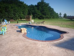 <div class='closebutton' onclick='return hs.close(this)' title='Close'></div><div class='firstH'><img src='images/logo-white-small.png'></div><h1>Free Form Fiberglass Pool</h1><p>Free Form - Cancun Fiberglass Pool #003 by Stoker Pools</p><div class='getSocial'><h1>Share</h1><p class='photoBy'>Photo by Stoker Pools</p><iframe src='http://www.facebook.com/plugins/like.php?href=http%3A%2F%2Fstokerpools.com&send=false&layout=button_count&width=100&show_faces=false&action=like&colorscheme=light&font&height=21' scrolling='no' frameborder='0' style='border:none; overflow:hidden; width:100px; height:21px;' allowTransparency='true'></iframe><br><a href='http://pinterest.com/pin/create/button/?url=http%3A%2F%2Fwww.stokerpools.com&media=http%3A%2F%2Fwww.stokerpools.com%2Fimages%2Fgalleries%2Fconcrete%2Fwm%2Fconcrete-pool-by-stoker-pools-001.jpg&description=Pools' data-pin-do='buttonPin' data-pin-config=\'above\'><img src='http://assets.pinterest.com/images/pidgets/pin_it_button.png' /></a><br></div>