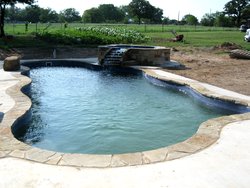 <div class='closebutton' onclick='return hs.close(this)' title='Close'></div><div class='firstH'><img src='images/logo-white-small.png'></div><h1>Free Form Fiberglass Pool</h1><p>Free Form - Caribbean Fiberglass Pool #002 by Stoker Pools</p><div class='getSocial'><h1>Share</h1><p class='photoBy'>Photo by Stoker Pools</p><iframe src='http://www.facebook.com/plugins/like.php?href=http%3A%2F%2Fstokerpools.com&send=false&layout=button_count&width=100&show_faces=false&action=like&colorscheme=light&font&height=21' scrolling='no' frameborder='0' style='border:none; overflow:hidden; width:100px; height:21px;' allowTransparency='true'></iframe><br><a href='http://pinterest.com/pin/create/button/?url=http%3A%2F%2Fwww.stokerpools.com&media=http%3A%2F%2Fwww.stokerpools.com%2Fimages%2Fgalleries%2Fconcrete%2Fwm%2Fconcrete-pool-by-stoker-pools-001.jpg&description=Pools' data-pin-do='buttonPin' data-pin-config=\'above\'><img src='http://assets.pinterest.com/images/pidgets/pin_it_button.png' /></a><br></div>