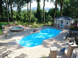 <div class='closebutton' onclick='return hs.close(this)' title='Close'></div><div class='firstH'><img src='images/logo-white-small.png'></div><h1>Free Form Fiberglass Pool</h1><p>Free Form - Gulf Shore Fiberglass Pool #004 by Stoker Pools</p><div class='getSocial'><h1>Share</h1><p class='photoBy'>Photo by Stoker Pools</p><iframe src='http://www.facebook.com/plugins/like.php?href=http%3A%2F%2Fstokerpools.com&send=false&layout=button_count&width=100&show_faces=false&action=like&colorscheme=light&font&height=21' scrolling='no' frameborder='0' style='border:none; overflow:hidden; width:100px; height:21px;' allowTransparency='true'></iframe><br><a href='http://pinterest.com/pin/create/button/?url=http%3A%2F%2Fwww.stokerpools.com&media=http%3A%2F%2Fwww.stokerpools.com%2Fimages%2Fgalleries%2Fconcrete%2Fwm%2Fconcrete-pool-by-stoker-pools-001.jpg&description=Pools' data-pin-do='buttonPin' data-pin-config=\'above\'><img src='http://assets.pinterest.com/images/pidgets/pin_it_button.png' /></a><br></div>