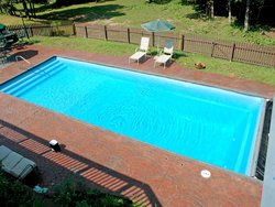 <div class='closebutton' onclick='return hs.close(this)' title='Close'></div><div class='firstH'><img src='images/logo-white-small.png'></div><h1>Rectangle Fiberglass Pool</h1><p>Rectangle - Monaco Fiberglass Pool #003 by Stoker Pools</p><div class='getSocial'><h1>Share</h1><p class='photoBy'>Photo by Stoker Pools</p><iframe src='http://www.facebook.com/plugins/like.php?href=http%3A%2F%2Fstokerpools.com&send=false&layout=button_count&width=100&show_faces=false&action=like&colorscheme=light&font&height=21' scrolling='no' frameborder='0' style='border:none; overflow:hidden; width:100px; height:21px;' allowTransparency='true'></iframe><br><a href='http://pinterest.com/pin/create/button/?url=http%3A%2F%2Fwww.stokerpools.com&media=http%3A%2F%2Fwww.stokerpools.com%2Fimages%2Fgalleries%2Fconcrete%2Fwm%2Fconcrete-pool-by-stoker-pools-001.jpg&description=Pools' data-pin-do='buttonPin' data-pin-config=\'above\'><img src='http://assets.pinterest.com/images/pidgets/pin_it_button.png' /></a><br></div>